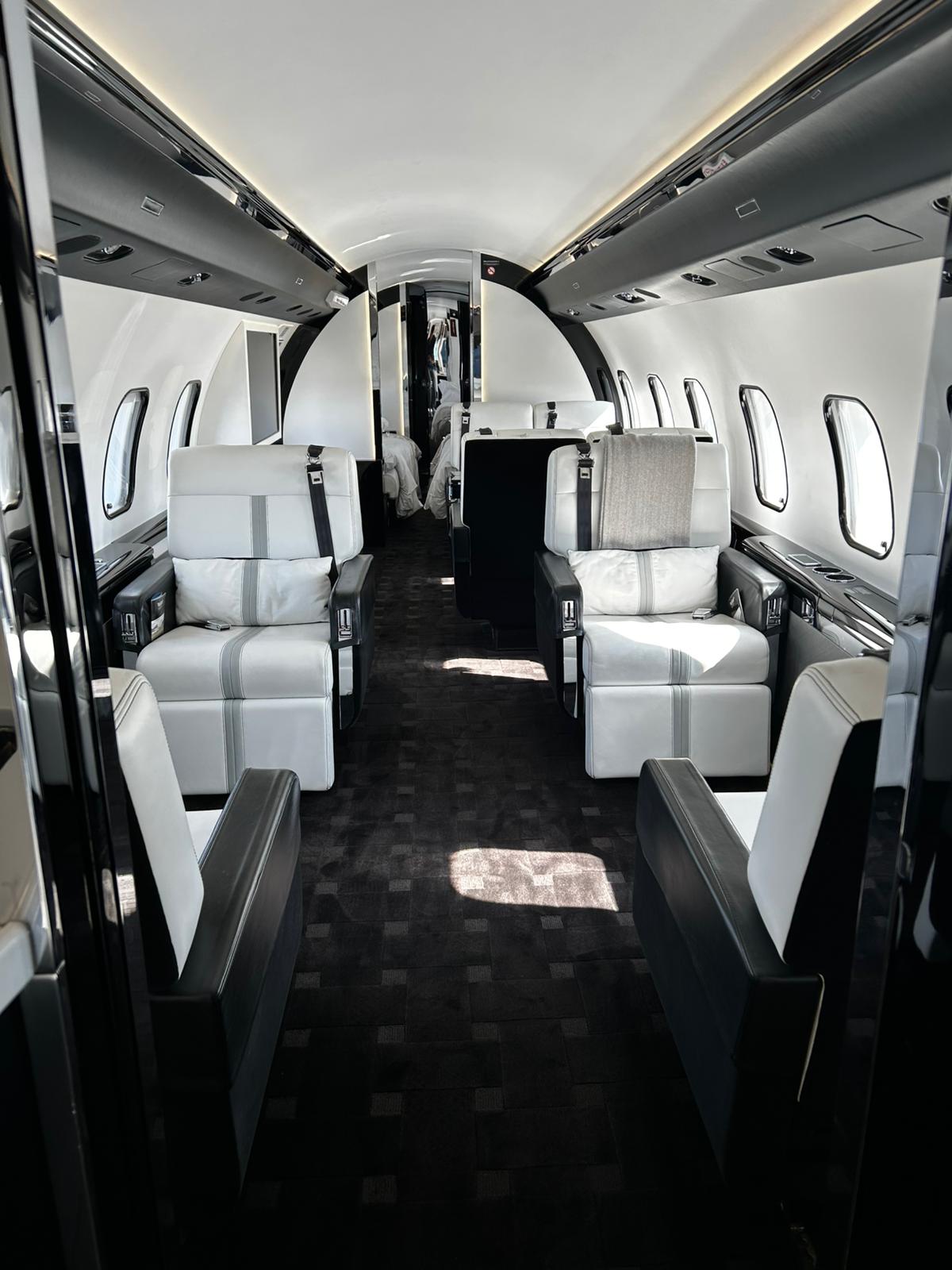 Luxury private jet interior cabin β how to book a charter flight with Haute Jets