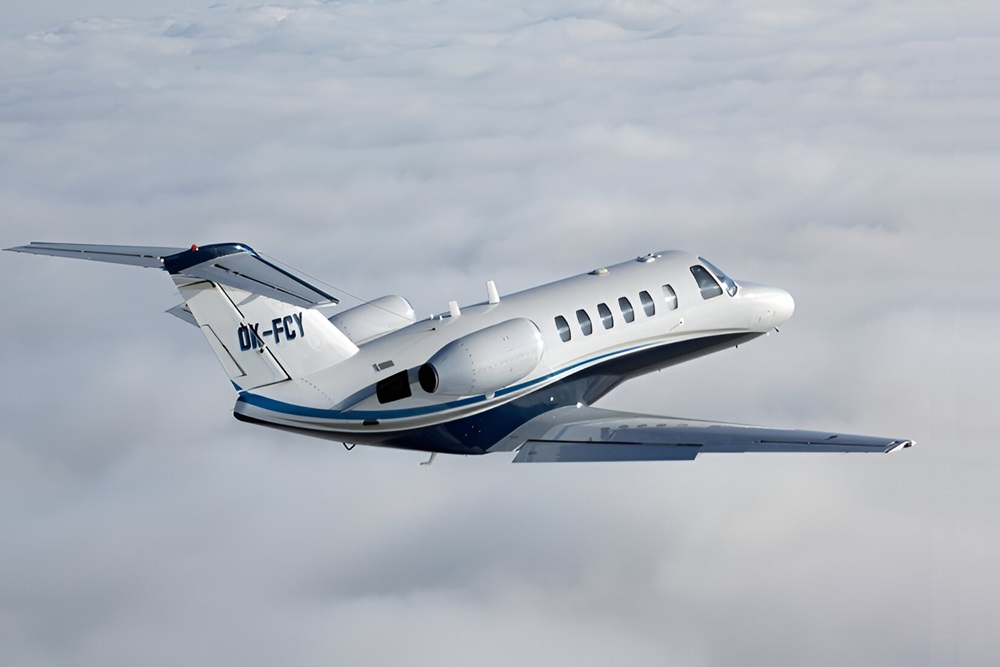 Citation CJ4 flying in the cloud