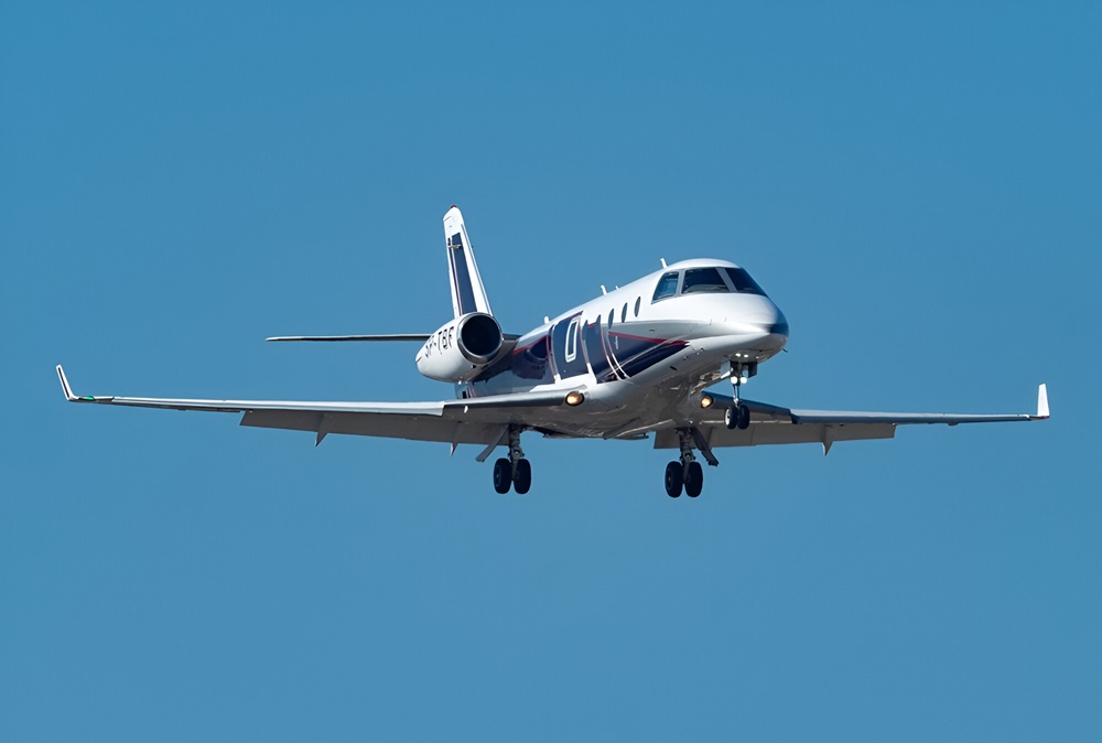 Gulfsream G150 flying in blue sky