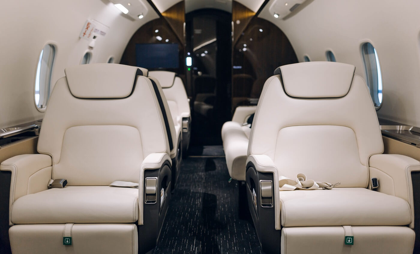 business jet airplane interior with comfortable leather seats