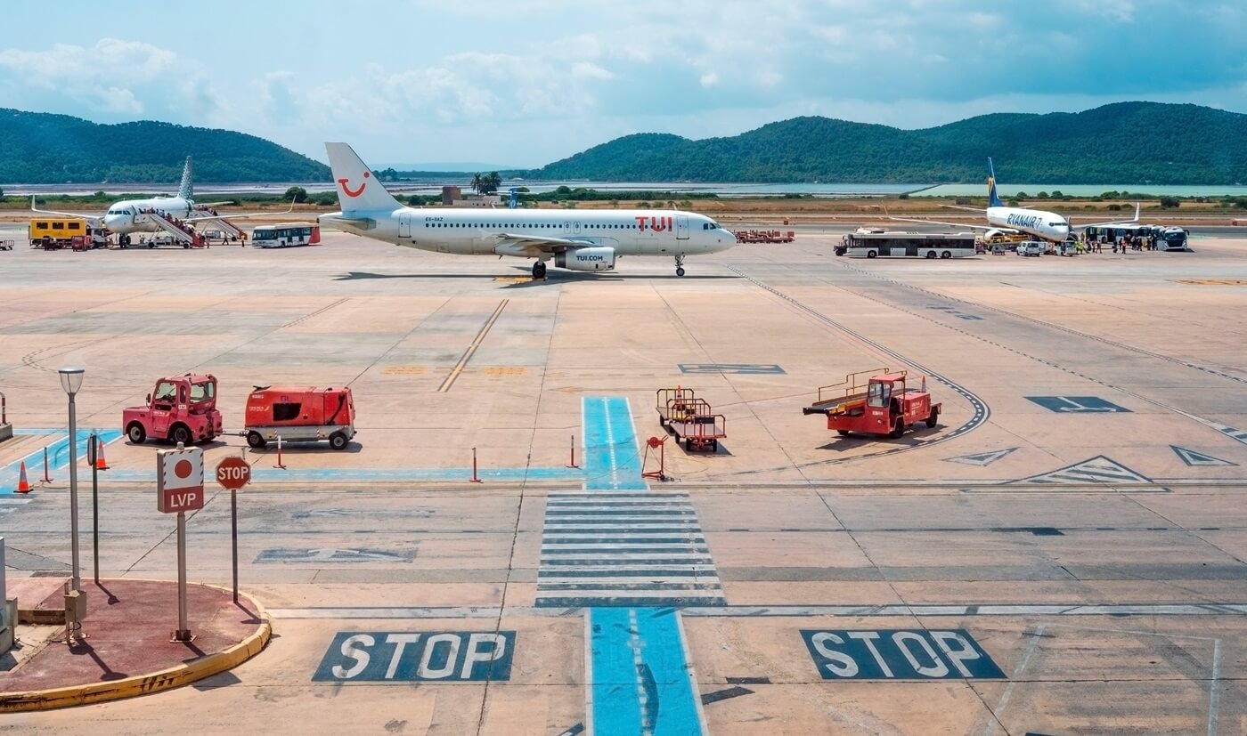 Hustle and bustle on the airport runways during the summer vacation time