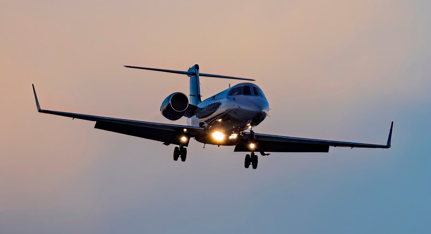 Learjet 45 arrives at the Centennial Airport at sunset