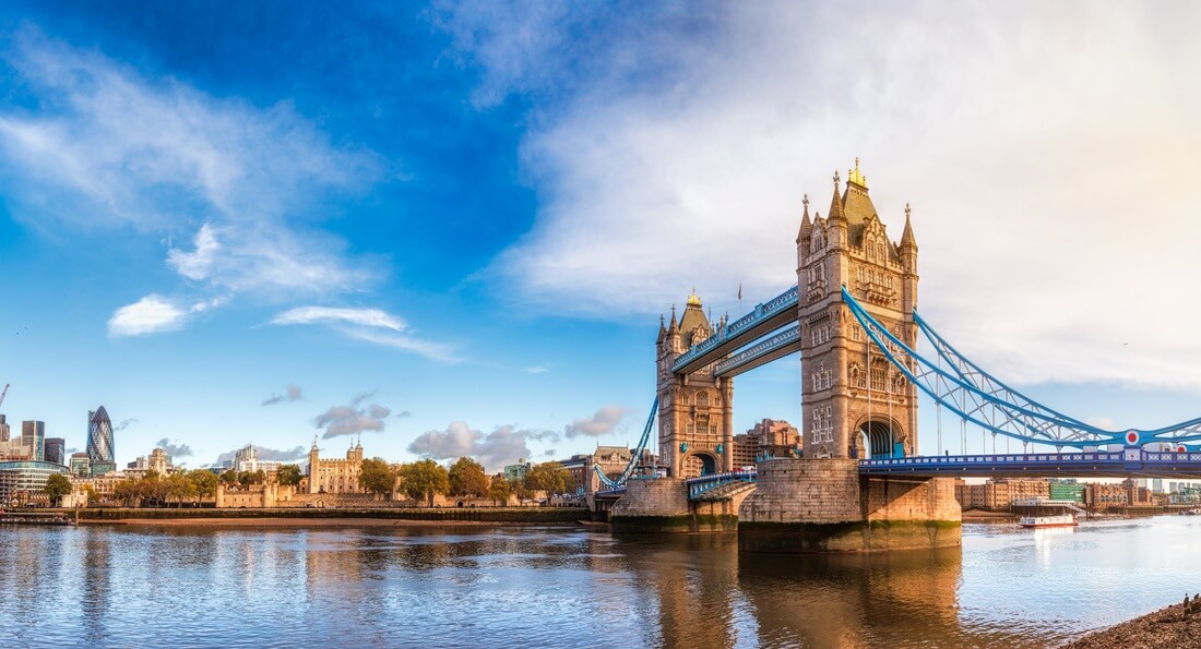 london cityscape panorama with River Thames Tower Bridge and Tower of London in the morning light