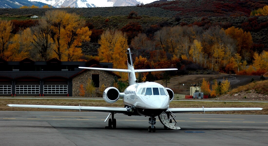 private jet parked in an airport