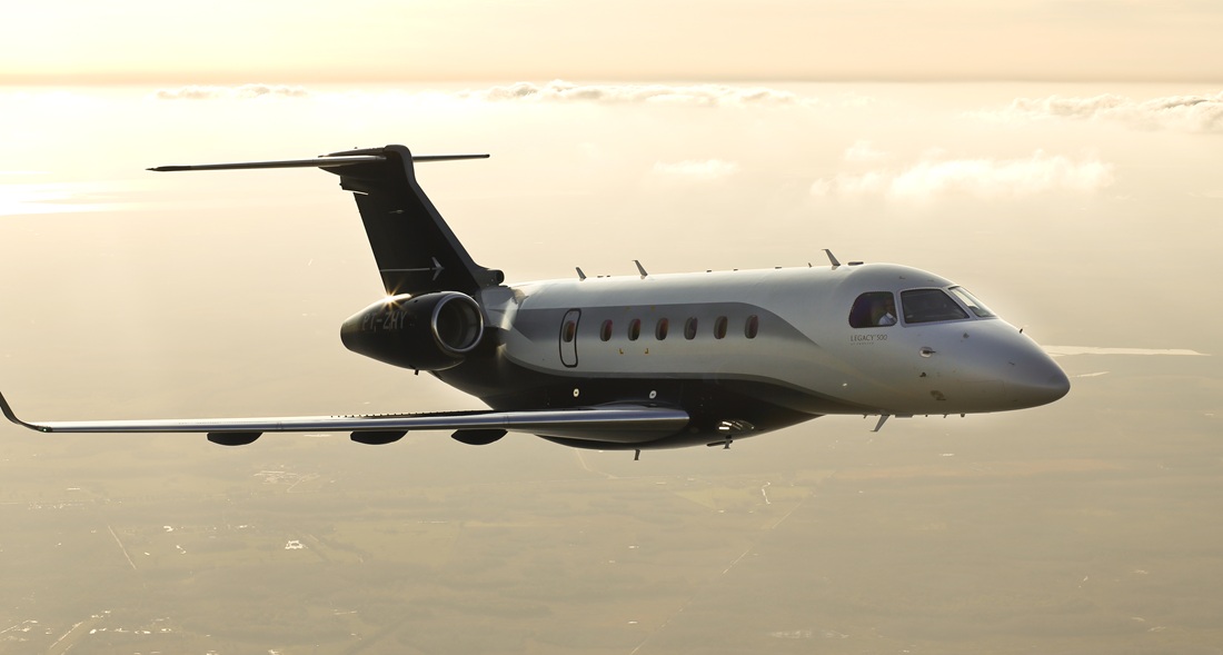 Legacy 500 Exterior Flight Sunset