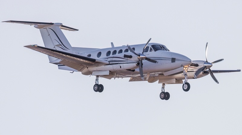 A King Air arrives at the Centennial Airport at sunset