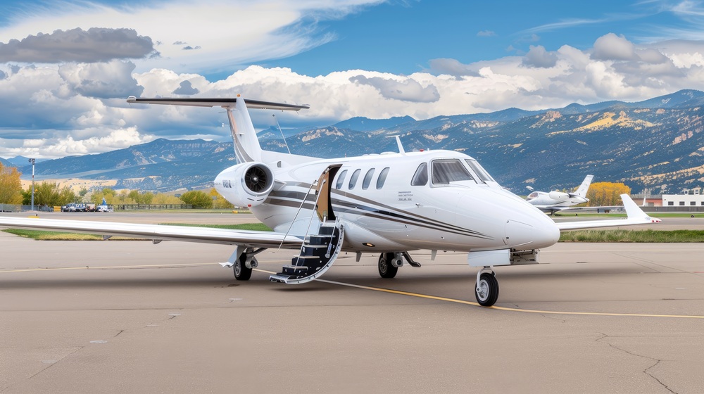 private jet sits on a snowy runway in the Alps