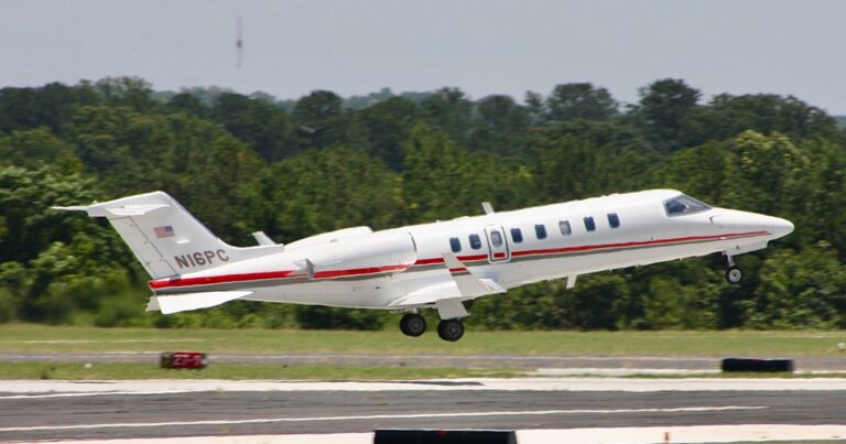 A Learjet 75 departing DeKalb-Peachtree Airport