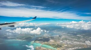 aerial vista captures Oahu, Hawaii, with the airport below