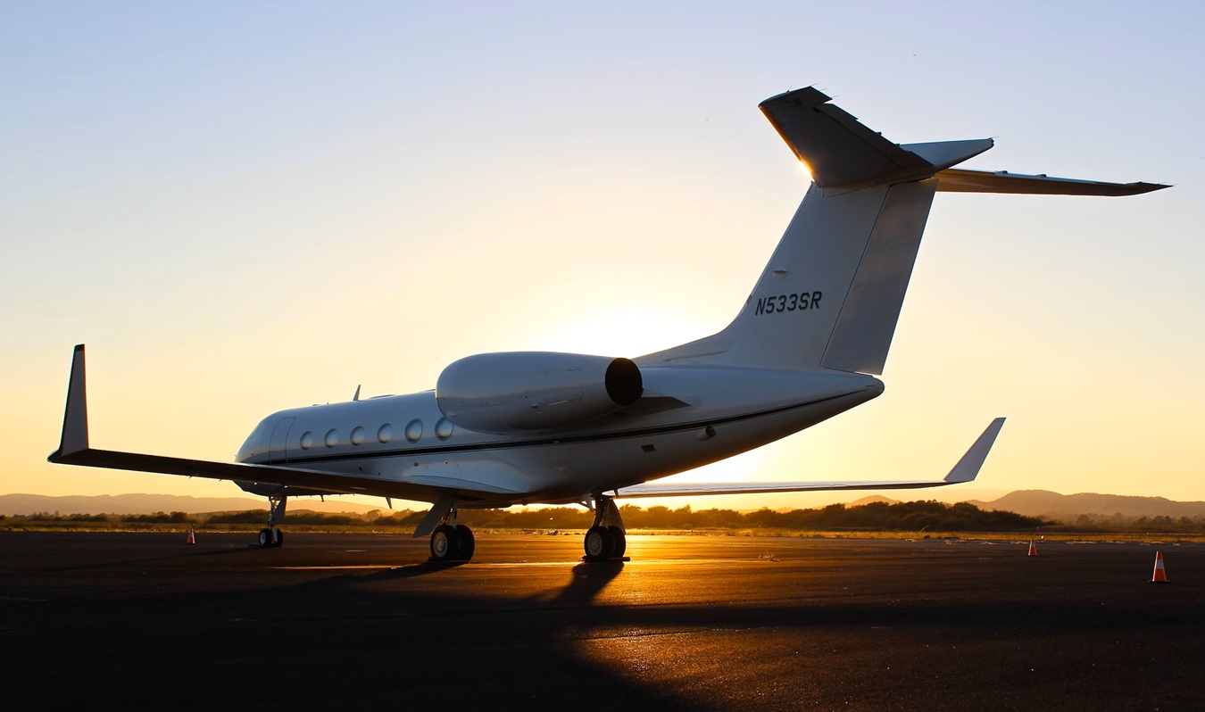 a prive jet plane in an airport