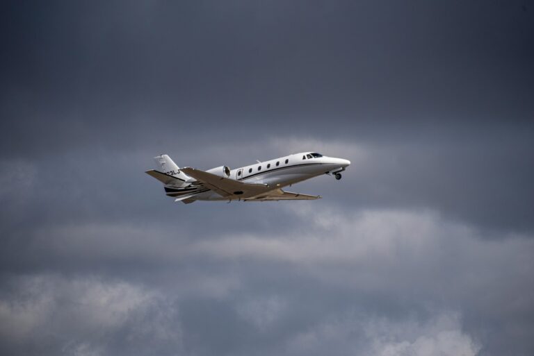 private jet in the clouds