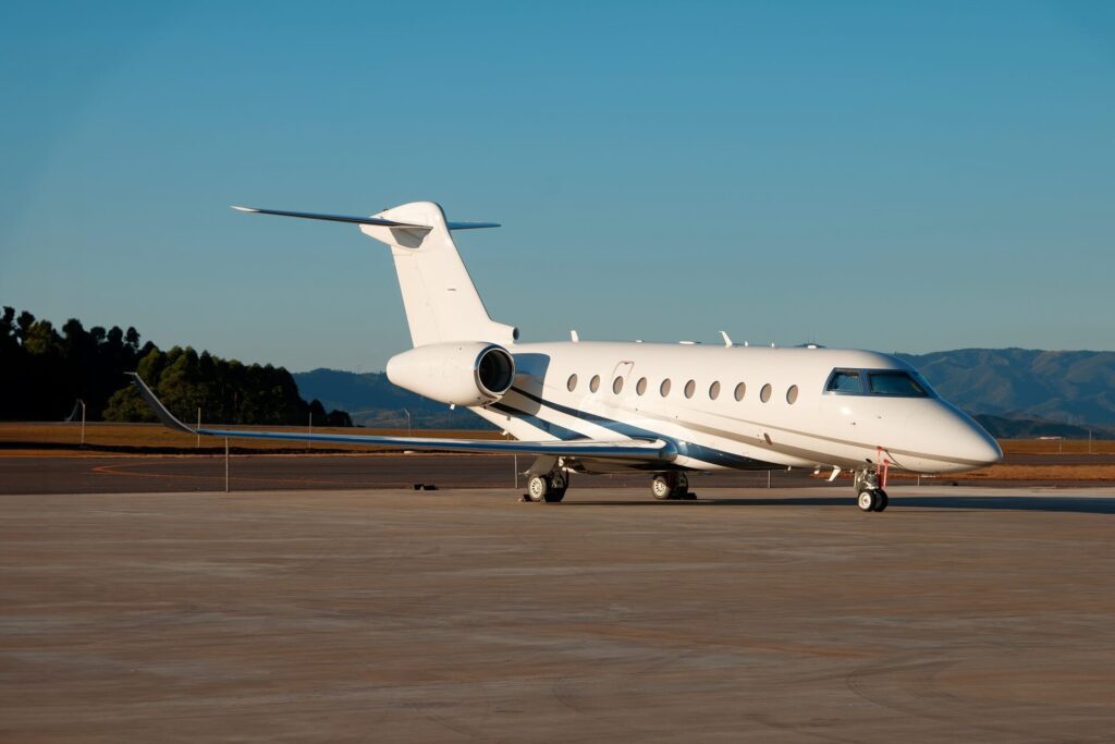 Private Gulfstream G280 airplane parked in the airport